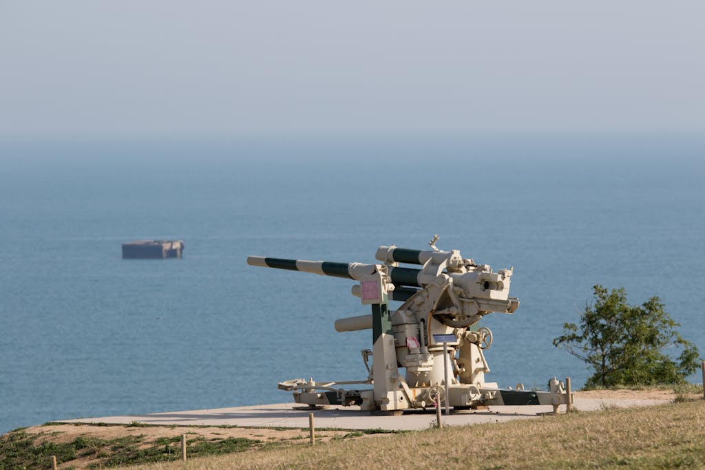 A historic cannon overlooking the sea at Arromanches-les-Bains in Normandy, France.