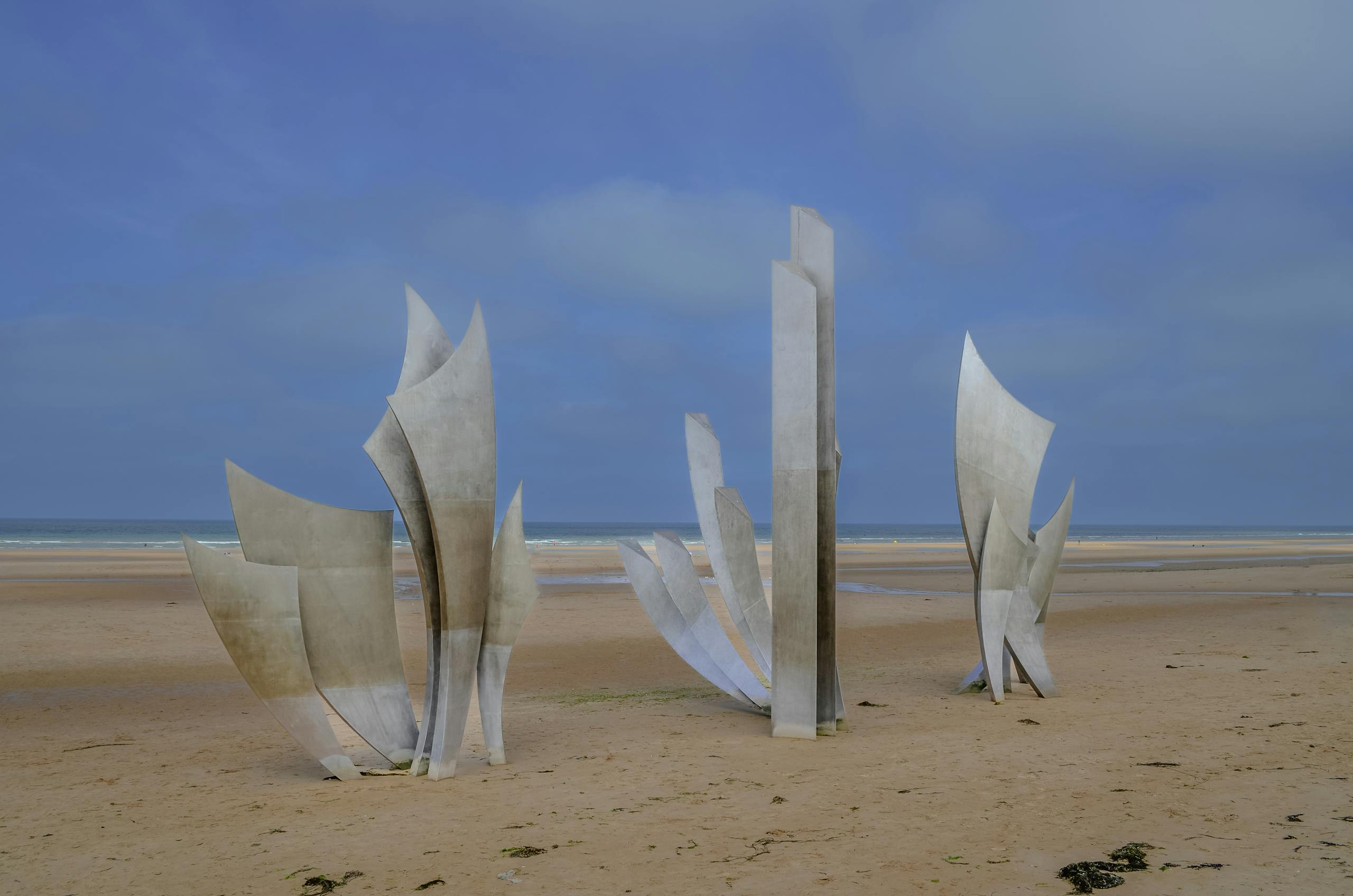 Le Monument des Braves sculpture on Omaha Beach in Normandy, France, honoring D-Day history.